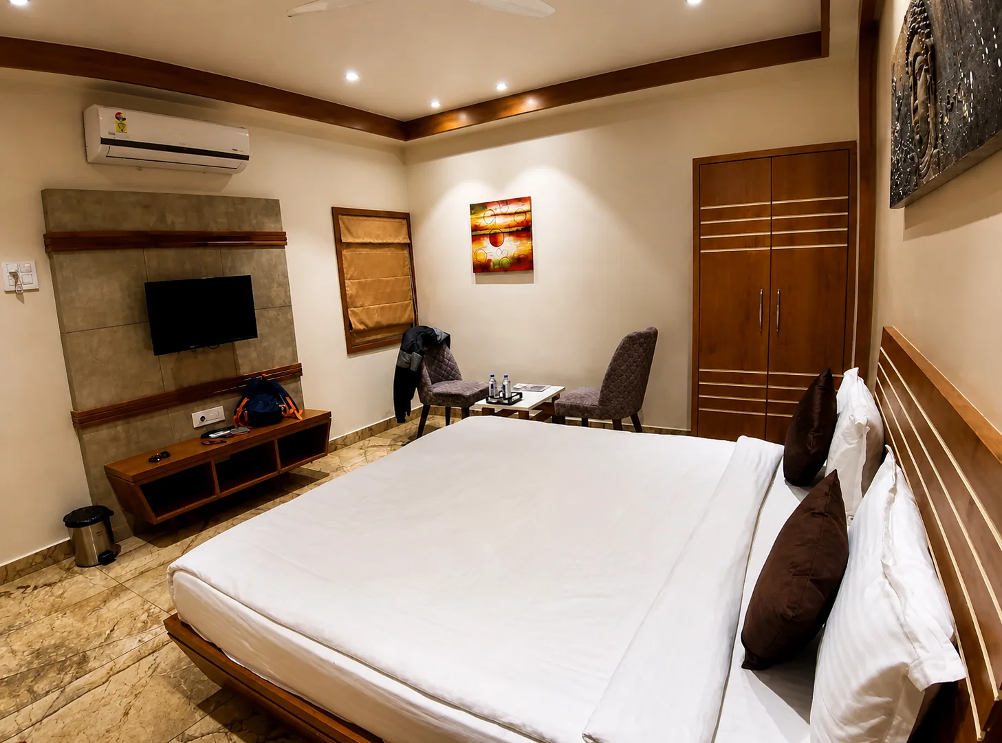 Double room with seating and television